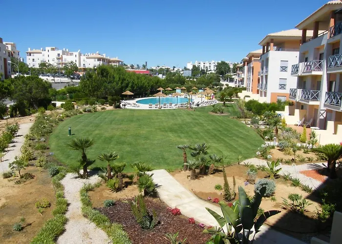 Luxurious First Floor Apartment With Balconies Overlooking Pool And Gardens.